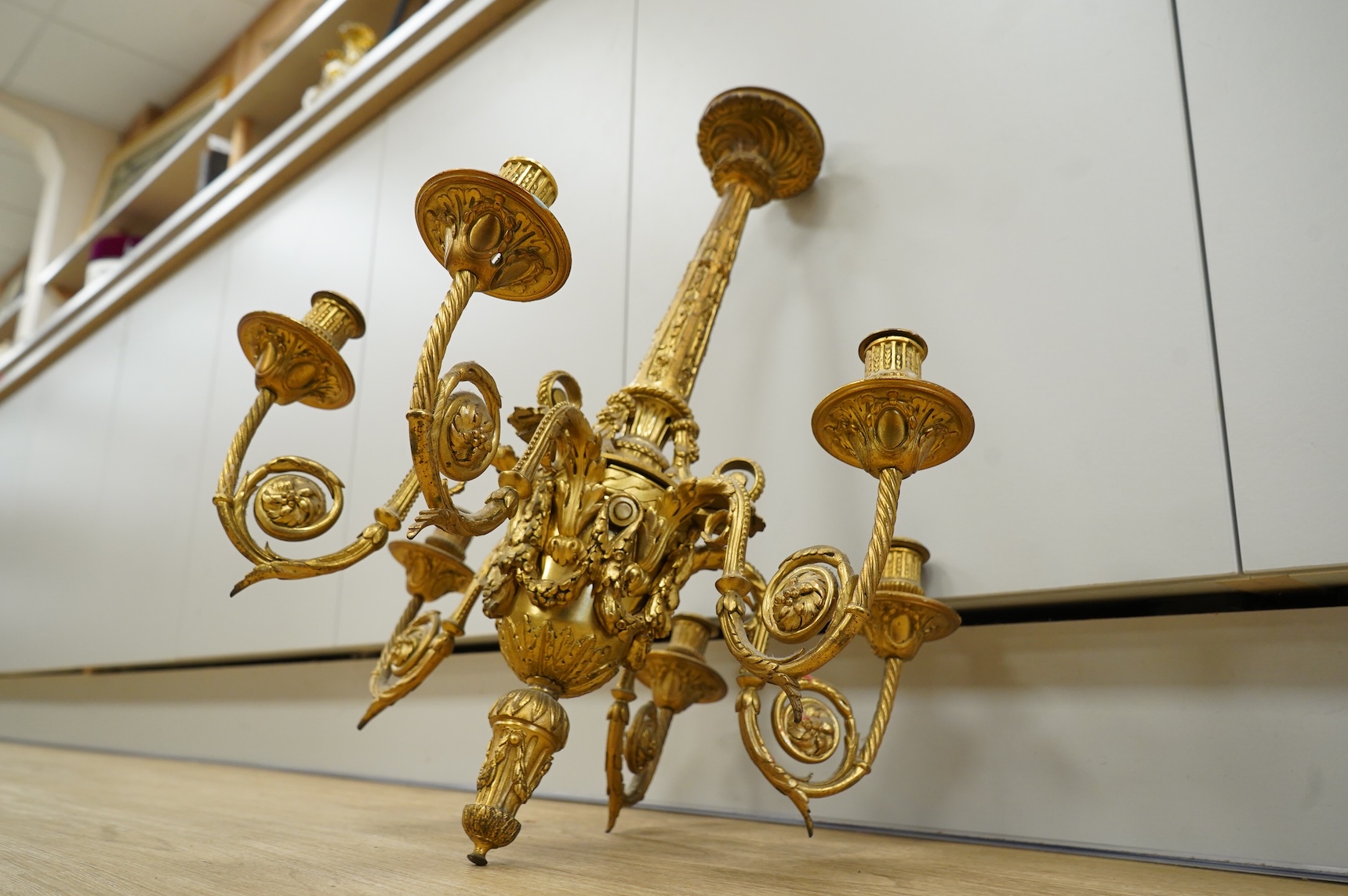 A Louis XVI style six branch ormolu electrolier, 62cm high